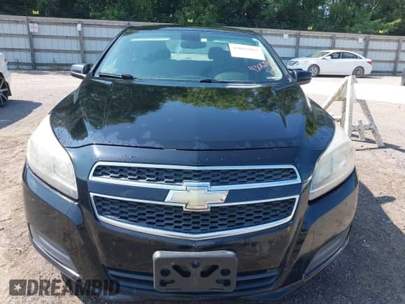 2013 Chevrolet Malibu LS z VIN 1G11A5SA1DU145088, wystawiony jako IAAI lot #43065967 z przebiegiem 169 725 mil mil oraz . Historia ofert i sprzedaży dostępna na DreamBid. Obrazek 6.