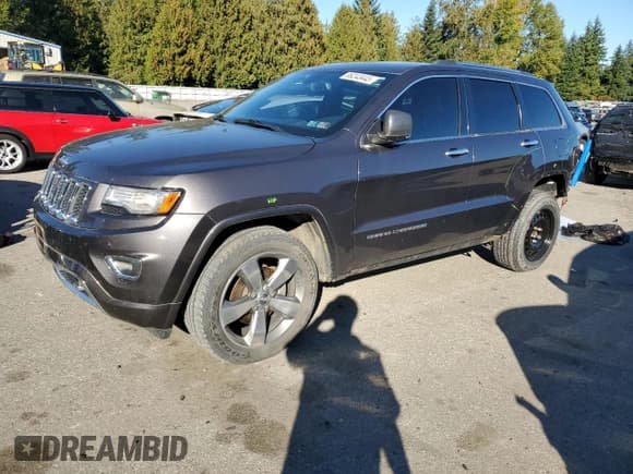 ✅ 2014 Jeep Grand Cherokee Overland • VIN: 1C4RJFCGXEC474530 • Lot: 86243445. Listed on Copart with 85,010 mi. Free auction sales archive from the USA and detailed vehicle history report at DreamBid. Image 1.