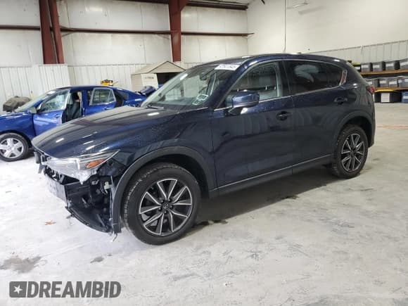 ✅ 2017 Mazda CX-5 Grand Touring • VIN: JM3KFBDL0H0160910 • Лот: 92841545. Опубликован ранее на Copart с пробегом 110 487 миль. Бесплатный доступ к архиву аукционных продаж из США и подробный отчёт об истории автомобиля на DreamBid. Изображение 1.