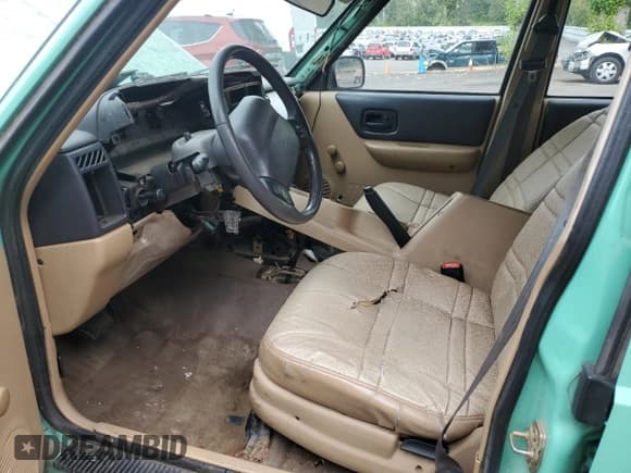✅ 1999 Jeep Cherokee SE • VIN: 1J4FF28SXXL641556 • Lot: 62605065. Listed on Copart with Not provided. Free auction sales archive from the USA and detailed vehicle history report at DreamBid. Image 7.