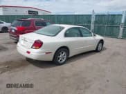 ✅ 2001 Oldsmobile Aurora • VIN: 1G3GR64H514231672 • Lot: 41872542. Wystawiony na IAAI z przebiegiem 167 271 mil. Bezpłatny archiwum sprzedaży aukcyjnych z USA i szczegółowy raport historii pojazdu na DreamBid. Zdjęcie 4.