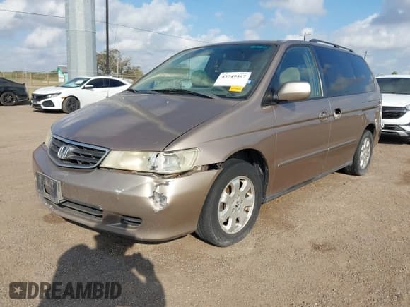 ✅ 2003 Honda Odyssey EX • VIN: 5FNRL18683B076195 • Lot: 43749467. Listed on IAAI with 233,314 mi. Free auction sales archive from the USA and detailed vehicle history report at DreamBid. Image 2.