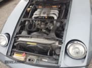 ✅ 1983 Porsche 928 • VIN: WP0ZZZ92ZDS841622 • Lot: 76995304. Wystawiony na Copart z przebiegiem 83 862 mil. Bezpłatny archiwum sprzedaży aukcyjnych z USA i szczegółowy raport historii pojazdu na DreamBid. Zdjęcie 11.