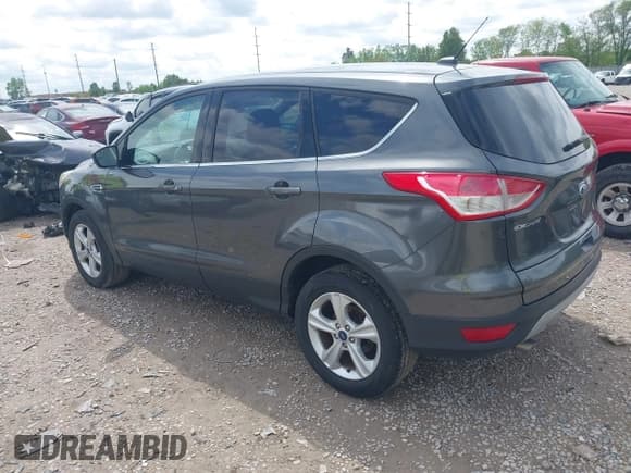 ✅ 2016 Ford Escape SE • VIN: 1FMCU9GXXGUC81604 • Lot: 42222349. Listed on IAAI with 106,188 mi. Free auction sales archive from the USA and detailed vehicle history report at DreamBid. Image 3.