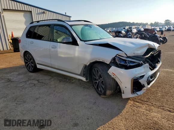 ✅ 2020 BMW X7 M50i • VIN: 5UXCX6C05L9C38130 • Lot: 71829275. Listed on Copart with 86,202 mi. Free auction sales archive from the USA and detailed vehicle history report at DreamBid. Image 4.