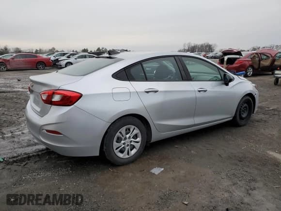 ✅ 2019 Chevrolet Cruze • VIN: 1G1BJ5SM8K7101969 • Lot: 70663322. Listed on Copart with 93,339 mi. Free auction sales archive from the USA and detailed vehicle history report at DreamBid. Image 3.