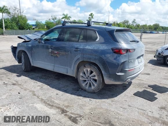 ✅ 2025 Mazda CX-50 Hybrid Premium Plus Package • VIN: 7MMVAAEW9SN127423 • Lot: 43322908. Wystawiony na IAAI z przebiegiem 2 928 mil. Bezpłatny archiwum sprzedaży aukcyjnych z USA i szczegółowy raport historii pojazdu na DreamBid. Zdjęcie 3.