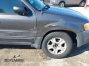 ✅ 2004 Ford Escape XLT • VIN: 1FMYU03164KB22170 • Lot: 41991801. Listed on IAAI with 170,492 mi. Free auction sales archive from the USA and detailed vehicle history report at DreamBid. Image 6.