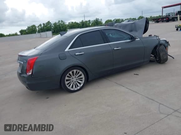 ✅ 2016 Cadillac CTS Performance Collection RWD • VIN: 1G6AS5SS5G0164531 • Lot: 42664999. Wystawiony na IAAI z przebiegiem 126 878 mil. Bezpłatny archiwum sprzedaży aukcyjnych z USA i szczegółowy raport historii pojazdu na DreamBid. Zdjęcie 4.