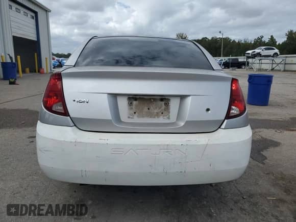 2004 Saturn ION ION 1 z VIN 1G8AG52FX4Z121029, wystawiony jako Copart lot #85560375 z przebiegiem 196 911 mil mil oraz Szkoda całkowita • Salvage title. Historia ofert i sprzedaży dostępna na DreamBid. Obrazek 6.