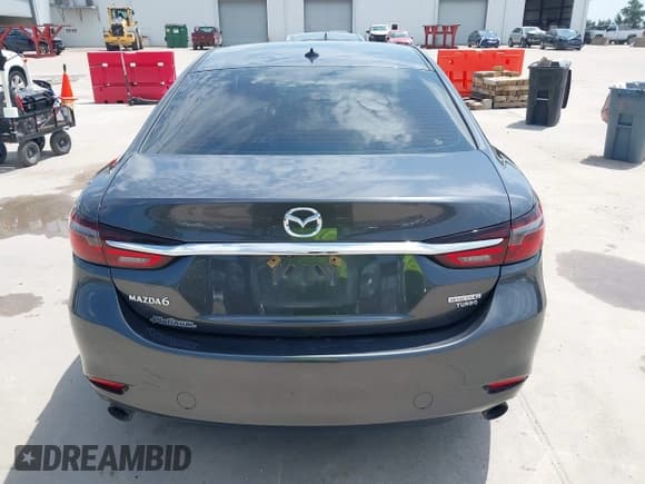 ✅ 2021 Mazda 6 Grand Touring • VIN: JM1GL1TYXM1615684 • Lot: 42690667. Listed on IAAI with 86,360 mi. Free auction sales archive from the USA and detailed vehicle history report at DreamBid. Image 16.