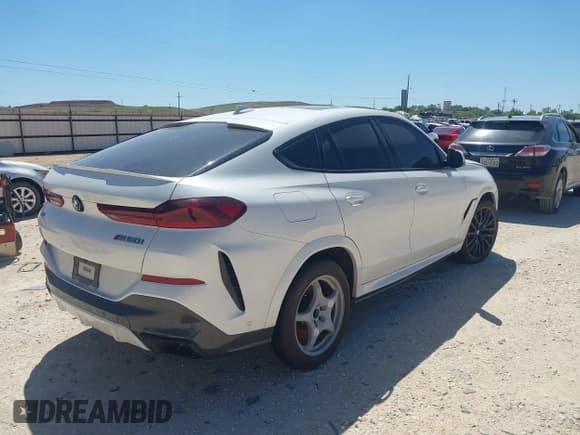 ✅ 2021 BMW X6 M50i • VIN: 5UXCY8C02M9H19933 • Лот: 42570118. Опубликован ранее на IAAI с пробегом 73 648 миль. Бесплатный доступ к архиву аукционных продаж из США и подробный отчёт об истории автомобиля на DreamBid. Изображение 4.