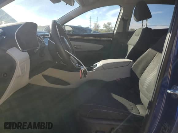 2023 Hyundai Tucson SEL z VIN 5NMJBCAEXPH161685, wystawiony jako Copart lot #87441155 z przebiegiem 51 147 mil mil oraz Szkoda całkowita • Salvage title. Historia ofert i sprzedaży dostępna na DreamBid. Obrazek 7.