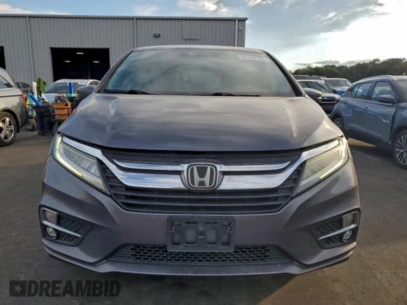 ✅ 2018 Honda Odyssey Touring • VIN: 5FNRL6H85JB029556 • Лот: 94162165. Опубликован ранее на Copart с пробегом 186 037 миль. Бесплатный доступ к архиву аукционных продаж из США и подробный отчёт об истории автомобиля на DreamBid. Изображение 5.