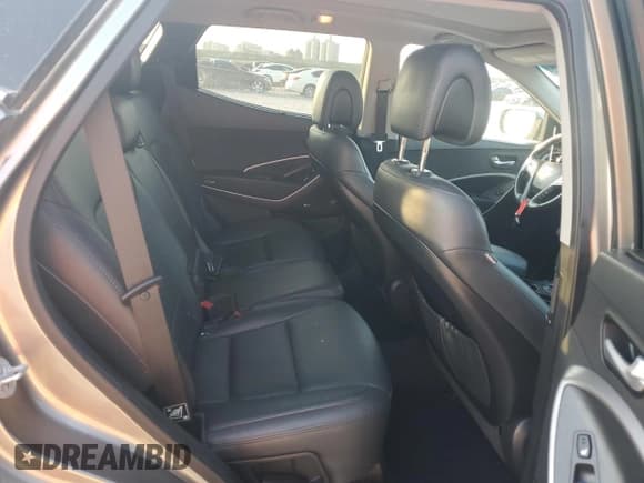 ✅ 2016 Hyundai Santa Fe • VIN: 5XYZW4LA4GG309833 • Лот: 69222605. Опубликован ранее на Copart с пробегом 91 052 миль. Бесплатный доступ к архиву аукционных продаж из США и подробный отчёт об истории автомобиля на DreamBid. Изображение 11.
