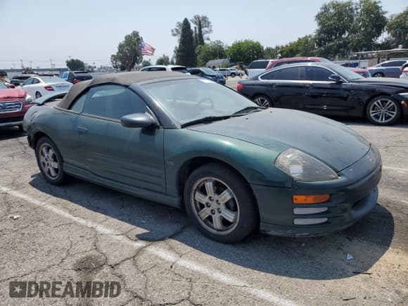 ✅ 2001 Mitsubishi Eclipse GT • VIN: 4A3AE85H31E029352 • Lot: 63770455. Listed on Copart with 92,311 mi. Free auction sales archive from the USA and detailed vehicle history report at DreamBid. Image 4.