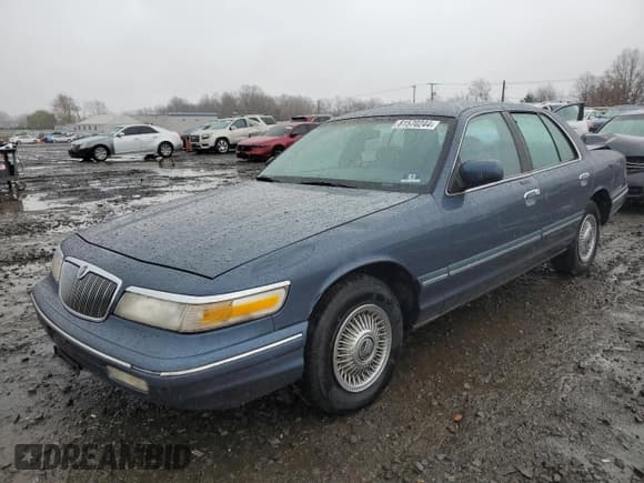 ✅ 1997 Mercury Grand Marquis GS • VIN: 2MELM74W4VX707814 • Lot: 81570244. Wystawiony na Copart z przebiegiem 155 752 mil. Bezpłatny archiwum sprzedaży aukcyjnych z USA i szczegółowy raport historii pojazdu na DreamBid. Zdjęcie 1.