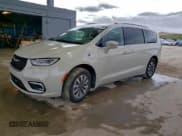 ✅ 2021 Chrysler Pacifica Hybrid Touring L • VIN: 2C4RC1L71MR585924 • Lot: 94079285. Listed on Copart with 101,595 mi. Free auction sales archive from the USA and detailed vehicle history report at DreamBid. Image 1.