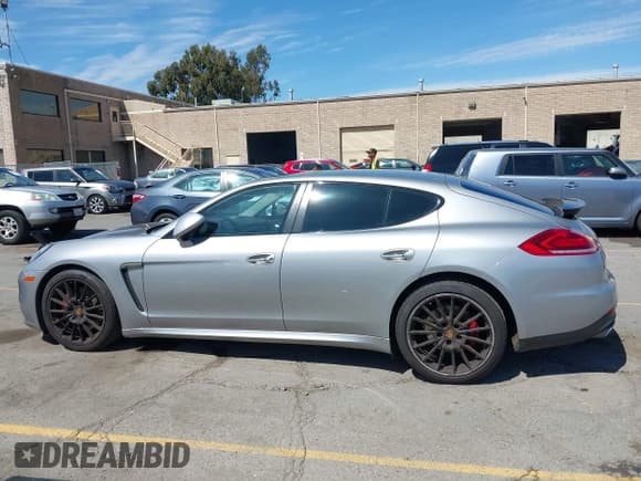 ✅ 2016 Porsche Panamera 4 • VIN: WP0AA2A7XGL005997 • Лот: 42671984. Опубликован ранее на IAAI с пробегом 95 983 миль. Бесплатный доступ к архиву аукционных продаж из США и подробный отчёт об истории автомобиля на DreamBid. Изображение 14.