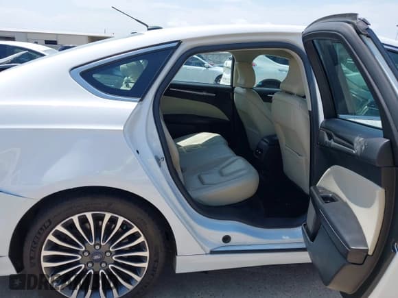 ✅ 2017 Ford Fusion Titanium • VIN: 3FA6P0K97HR114628 • Lot: 43023302. Listed on IAAI with 90,892 mi. Free auction sales archive from the USA and detailed vehicle history report at DreamBid. Image 8.