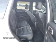 ✅ 2015 Jeep Grand Cherokee Summit • VIN: 1C4RJEJG0FC118974 • Lot: 49002165. Listed on Copart with 112,463 mi. Free auction sales archive from the USA and detailed vehicle history report at DreamBid. Image 11.