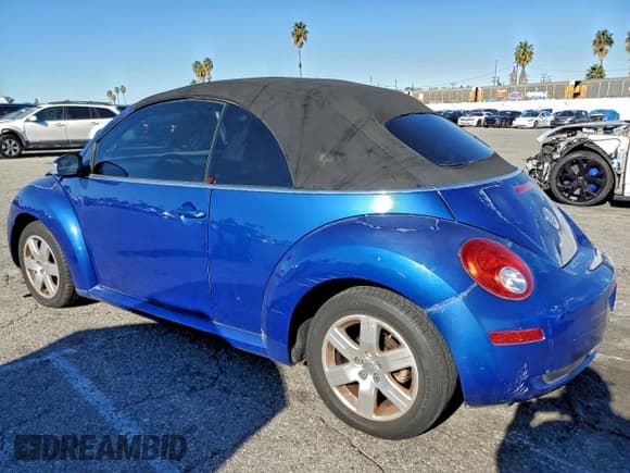 ✅ 2007 Volkswagen Beetle • VIN: 3VWRF31Y57M404119 • Lot: 95076605. Listed on Copart with 106,702 mi. Free auction sales archive from the USA and detailed vehicle history report at DreamBid. Image 2.