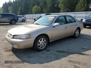 ✅ 1997 Toyota Camry LE • VIN: JT2BF22K4V0074975 • Lot: 83843615. Listed on Copart with 254,354 mi. Free auction sales archive from the USA and detailed vehicle history report at DreamBid. Image 1.