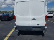 ✅ 2017 Ford Transit • VIN: 1FTKE1CM1HKA13984 • Lot: 42890982. Listed on IAAI with 147,923 mi. Free auction sales archive from the USA and detailed vehicle history report at DreamBid. Image 18.