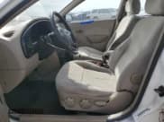 ✅ 2003 Kia Spectra • VIN: KNAFB121635229450 • Лот: 47084595. Опубликован ранее на Copart с пробегом 200 586 миль. Бесплатный доступ к архиву аукционных продаж из США и подробный отчёт об истории автомобиля на DreamBid. Изображение 7.