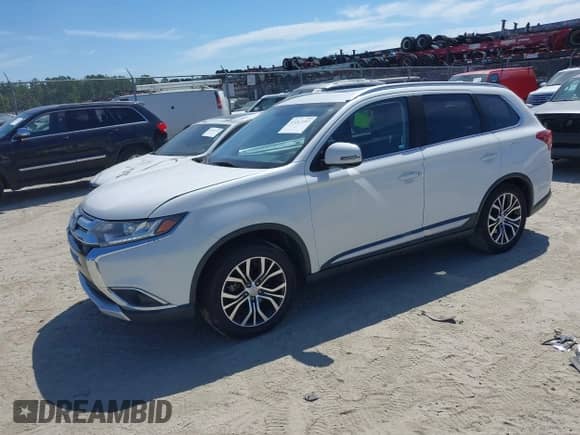2018 Mitsubishi Outlander SE with VIN JA4AD3A38JZ053880, listed as a IAAI auction lot 43217197 with 131,340 mi miles and . Bid and sale history available at DreamBid. Image 2.