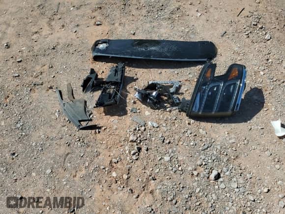 2015 Chevrolet Tahoe LTZ with VIN 1GNSKCKC6FR170659, listed as a Copart auction lot 69412835 with 252,198 mi miles and Salvage title. Bid and sale history available at DreamBid. Image 13.