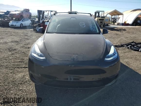 ✅ 2022 Tesla Model Y Long Range • VIN: 7SAYGDEE2NF391349 • Lot: 85351924. Wystawiony na Copart z przebiegiem 5 670 mil. Bezpłatny archiwum sprzedaży aukcyjnych z USA i szczegółowy raport historii pojazdu na DreamBid. Zdjęcie 5.
