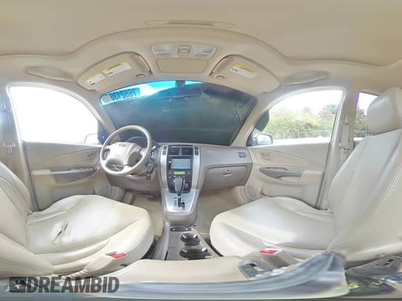 2006 Hyundai Tucson GLS z VIN KM8JN72D16U421074, wystawiony jako Copart lot #76521304 z przebiegiem 120 172 mil mil oraz Szkoda całkowita • Salvage title. Historia ofert i sprzedaży dostępna na DreamBid. Obrazek 13.