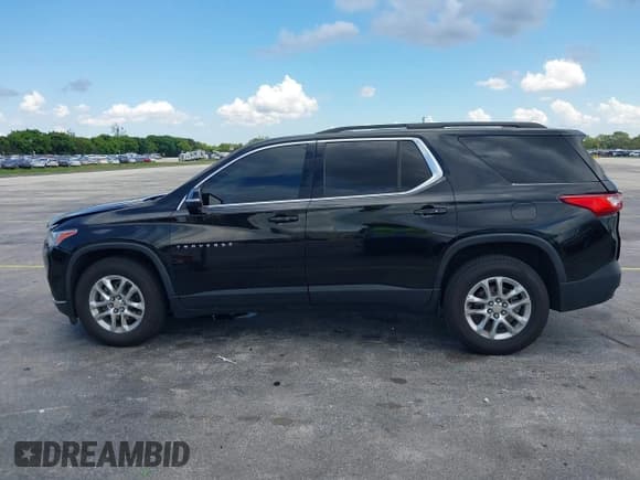 ✅ 2021 Chevrolet Traverse LT Cloth • VIN: 1GNERGKW8MJ162827 • Lot: 42862301. Listed on IAAI with 73,724 mi. Free auction sales archive from the USA and detailed vehicle history report at DreamBid. Image 14.