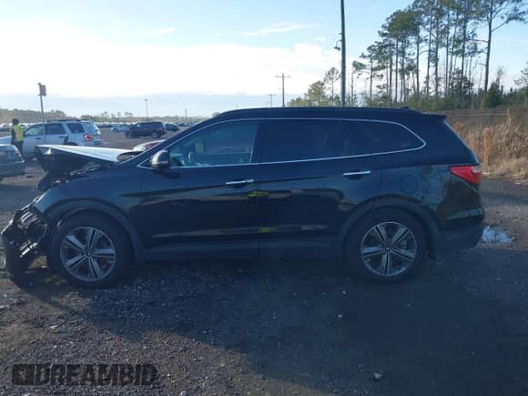 2015 Hyundai Santa Fe Limited with VIN KM8SR4HF4FU100632, listed as a IAAI auction lot 41339216 with 197,985 mi miles and . Bid and sale history available at DreamBid. Image 14.