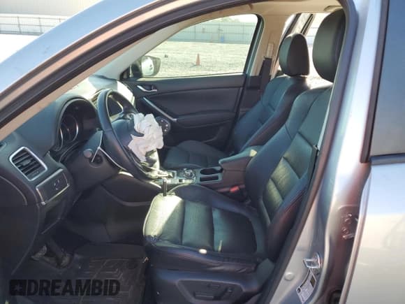 ✅ 2016 Mazda CX-5 Grand Touring • VIN: JM3KE4DY3G0838560 • Lot: 82567945. Listed on Copart with 74,284 mi. Free auction sales archive from the USA and detailed vehicle history report at DreamBid. Image 7.