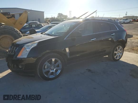 ✅ 2012 Cadillac SRX Performance Collection • VIN: 3GYFNBE33CS646165 • Lot: 90860355. Wystawiony na Copart z przebiegiem 157 539 mil. Bezpłatny archiwum sprzedaży aukcyjnych z USA i szczegółowy raport historii pojazdu na DreamBid. Zdjęcie 1.