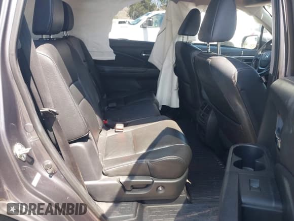 ✅ 2016 Honda Pilot EX-L • VIN: 5FNYF5H7XGB060234 • Lot: 43194968. Listed on IAAI with 130,758 mi. Free auction sales archive from the USA and detailed vehicle history report at DreamBid. Image 8.