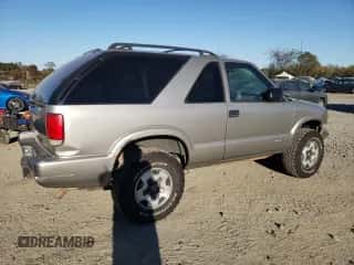 2005 Chevrolet Blazer LS with VIN 1GNCT18X55K110900, listed as a Copart auction lot 76983804 with 59,765 mi miles and Salvage title. Bid and sale history available at DreamBid. Image 3.