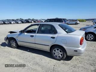 ✅ 2001 Suzuki Esteem GL • VIN: JS2GB41S215208522 • Lot: 90477065. Wystawiony na Copart z przebiegiem 105 291 mil. Bezpłatny archiwum sprzedaży aukcyjnych z USA i szczegółowy raport historii pojazdu na DreamBid. Zdjęcie 2.