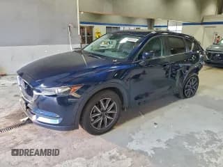 ✅ 2018 Mazda CX-5 Touring • VIN: JM3KFBCM0J0426491 • Lot: 94990025. Listed on Copart with 74,844 mi. Free auction sales archive from the USA and detailed vehicle history report at DreamBid. Image 1.