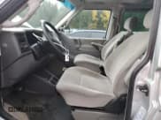 ✅ 2001 Volkswagen EuroVan MV • VIN: WV2MB47031H098986 • Lot: 77587294. Wystawiony na Copart z przebiegiem 161 046 mil. Bezpłatny archiwum sprzedaży aukcyjnych z USA i szczegółowy raport historii pojazdu na DreamBid. Zdjęcie 7.