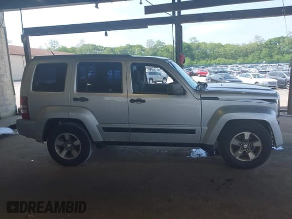 ✅ 2011 Jeep Liberty Sport Jet • VIN: 1J4PN2GK4BW531246 • Lot: 42430928. Listed on IAAI with 142,887 mi. Free auction sales archive from the USA and detailed vehicle history report at DreamBid. Image 13.