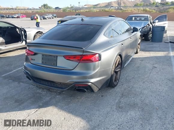 ✅ 2022 Audi RS 5 Sportback • VIN: WUAAWCF52NA902922 • Lot: 42484023. Wystawiony na IAAI z przebiegiem 37 014 mil. Bezpłatny archiwum sprzedaży aukcyjnych z USA i szczegółowy raport historii pojazdu na DreamBid. Zdjęcie 4.