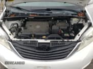 ✅ 2014 Toyota Sienna LE • VIN: 5TDKK3DC7ES481247 • Lot: 86280535. Listed on Copart with 73,333 mi. Free auction sales archive from the USA and detailed vehicle history report at DreamBid. Image 12.