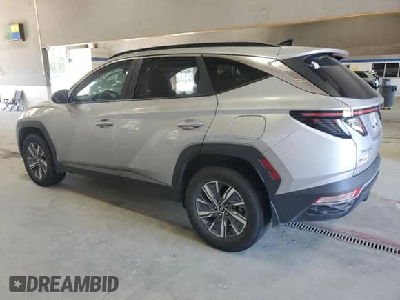 2023 Hyundai Tucson Blue z VIN KM8JBCA12PU091438, wystawiony jako Copart lot #57264655 z przebiegiem 72 768 mil mil oraz Szkoda całkowita • Salvage title. Historia ofert i sprzedaży dostępna na DreamBid. Obrazek 2.