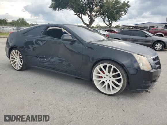✅ 2012 Cadillac CTS • VIN: 1G6DA1E37C0142277 • Lot: 68264685. Listed on Copart with 123,903 mi. Free auction sales archive from the USA and detailed vehicle history report at DreamBid. Image 4.