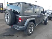 ✅ 2021 Jeep Wrangler Unlimited Sahara • VIN: 1C4HJXEN4MW503014 • Lot: 41900234. Listed on IAAI with 16,444 mi. Free auction sales archive from the USA and detailed vehicle history report at DreamBid. Image 4.