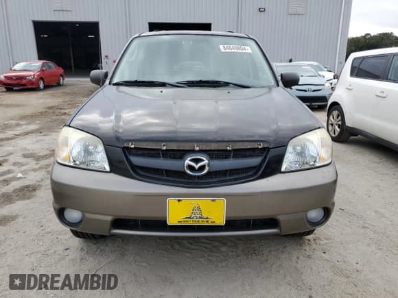✅ 2004 Mazda Tribute LX • VIN: 4F2YZ94164KM25510 • Lot: 84049804. Listed on Copart with 111,929 mi. Free auction sales archive from the USA and detailed vehicle history report at DreamBid. Image 5.