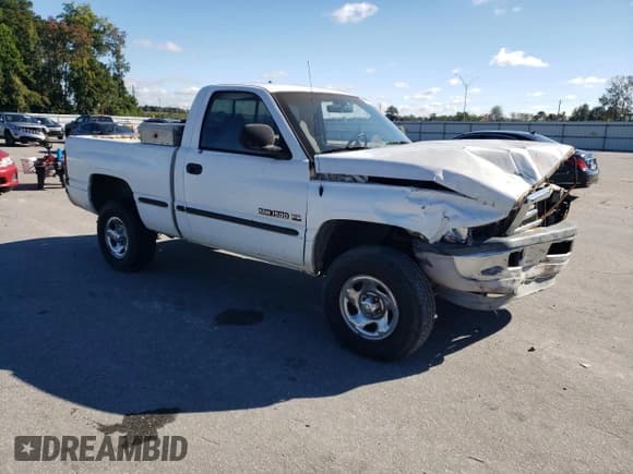 ✅ 1999 Dodge 1500 • VIN: 1B7HF16Y6XS253472 • Lot: 86786265. Listed on Copart with 423,593 mi. Free auction sales archive from the USA and detailed vehicle history report at DreamBid. Image 4.